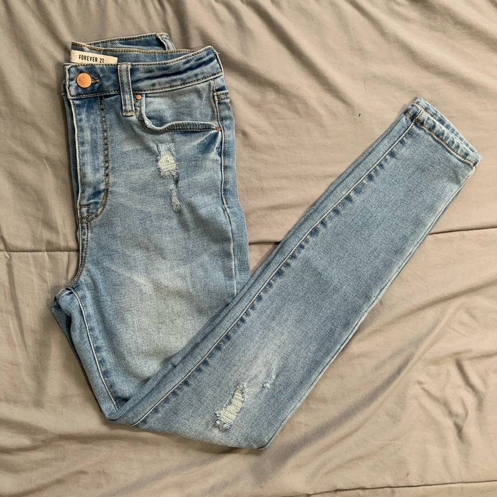 High waisted distressed jeans